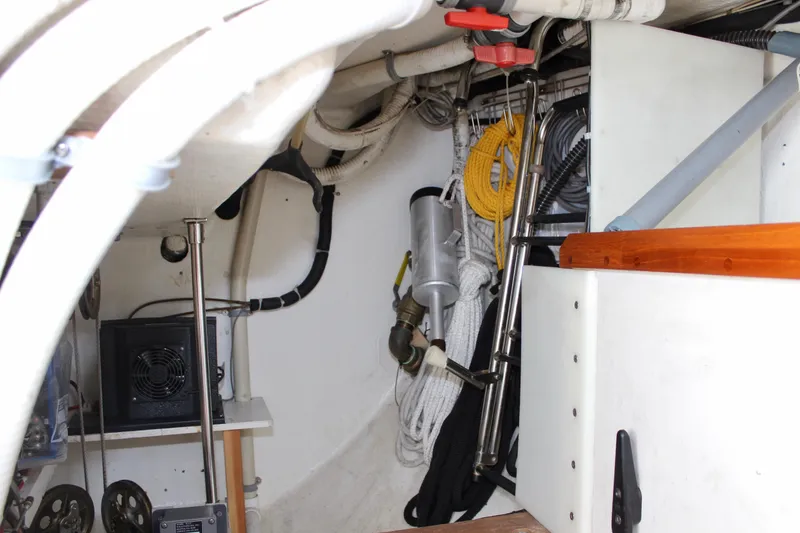 Slide: The Image of Engine room of a 1993 Freya 39 sailboat with ropes and equipment. - 36