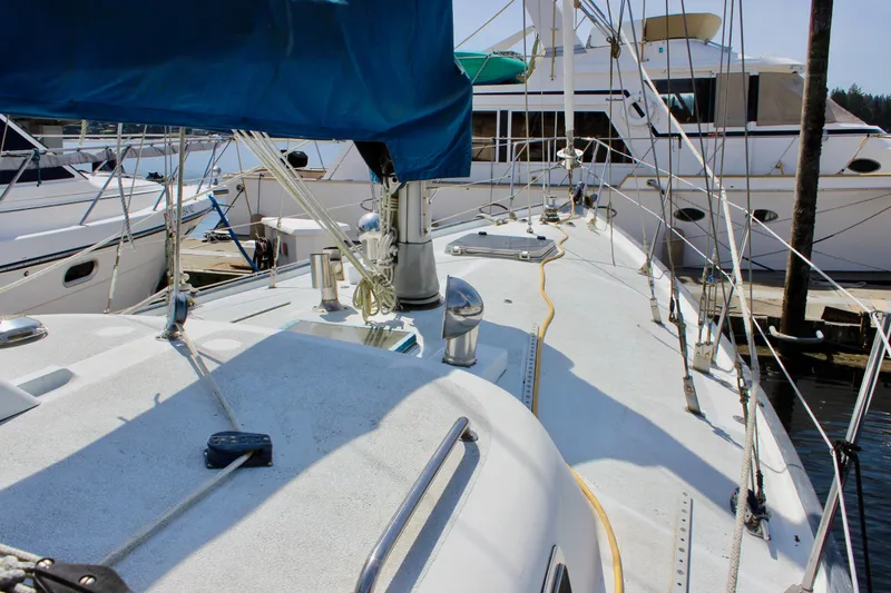 Slide: The Image of Sailboat deck view of 1993 Freya 39 model docked at marina. - 4