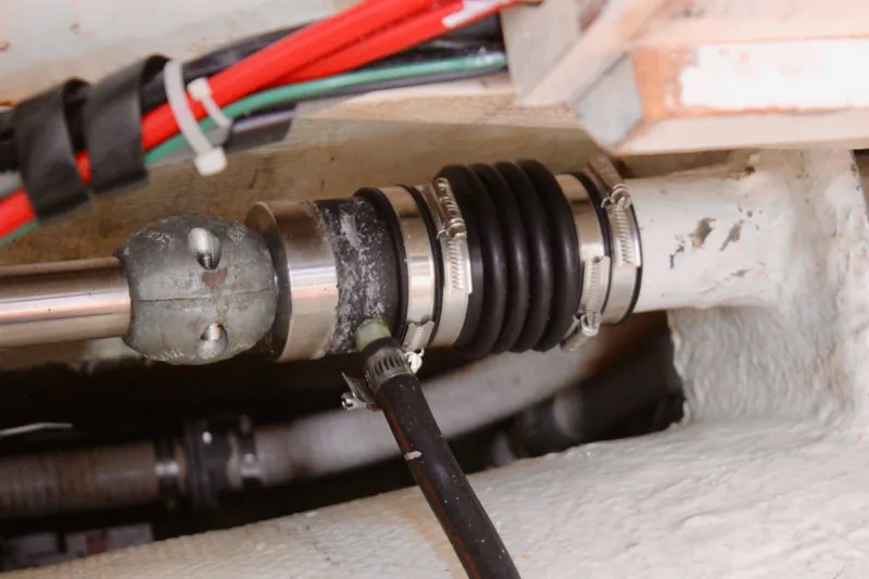 Slide: The Image of Close-up of a Freya 39 sailboat's shaft seal system, featuring clamps and wiring, 1993 model. - 45