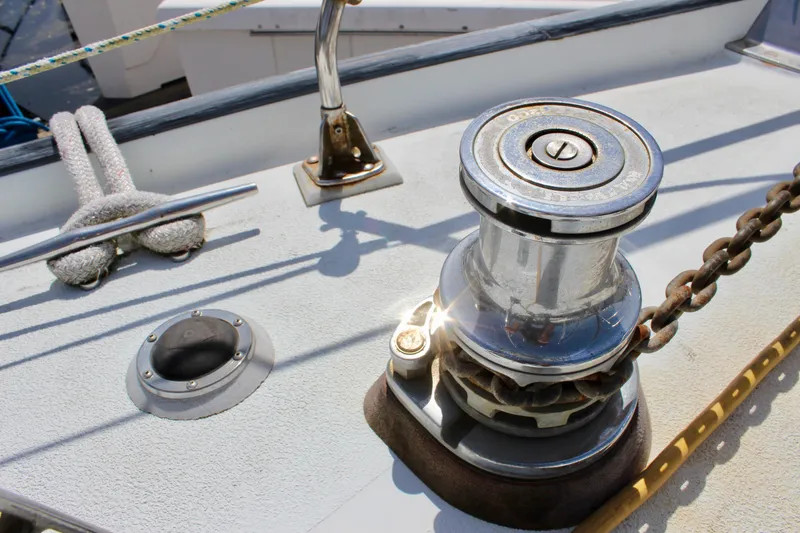 Slide: The Image of Deck of 1993 Freya 39 sailboat featuring winch and cleat with rope. - 7
