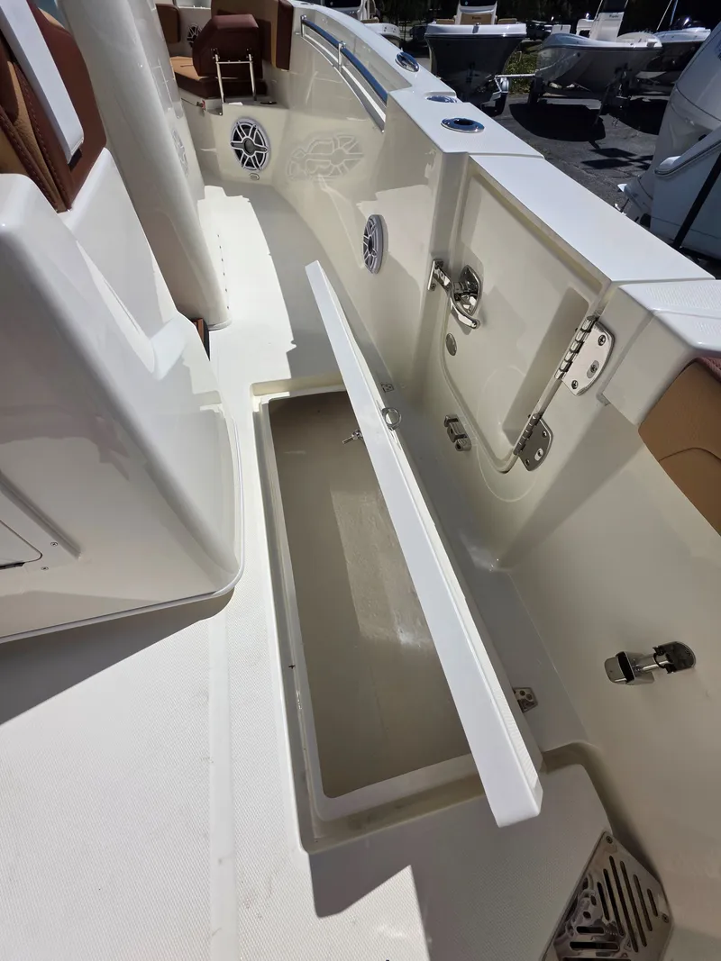 Slide: The Image of Interior view of Cobia 245CC boat, model year 2026. - 13