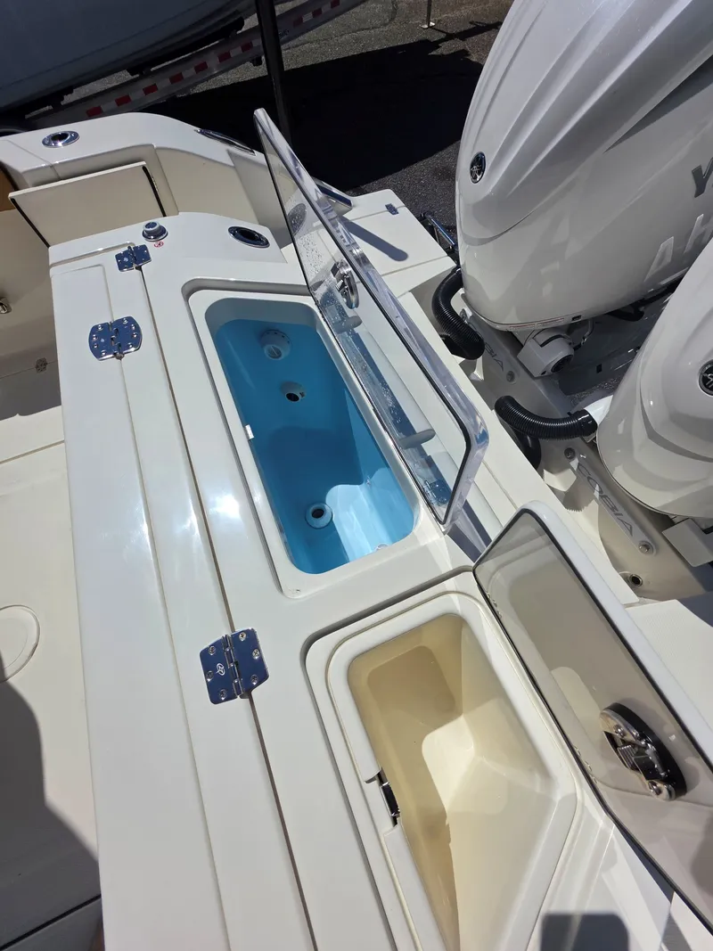 Slide: The Image of Cobia 245CC 2026 with engine and storage compartments. - 9