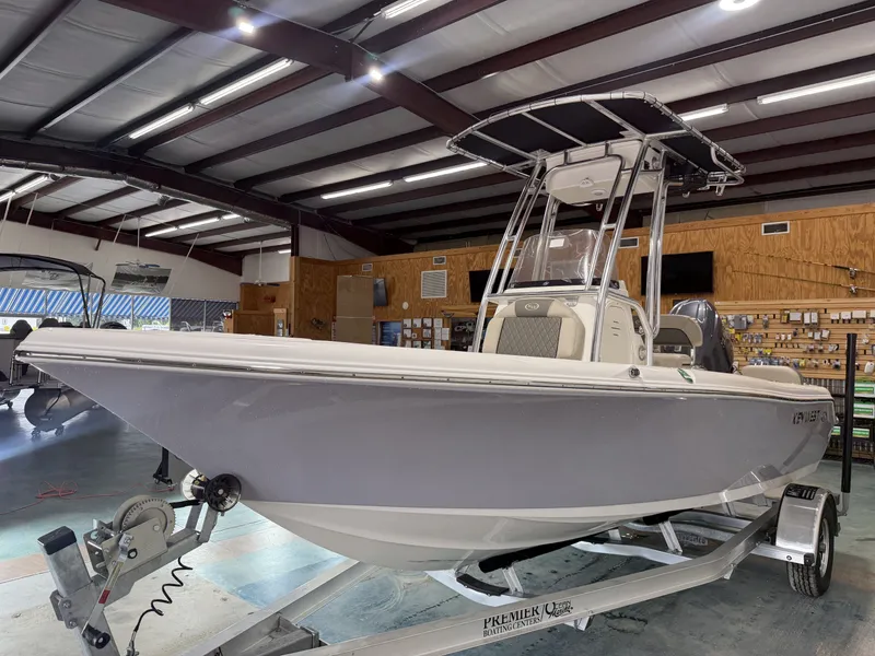 Slide: The Image of Key West 189 FS 2026 boat in showroom. - 11