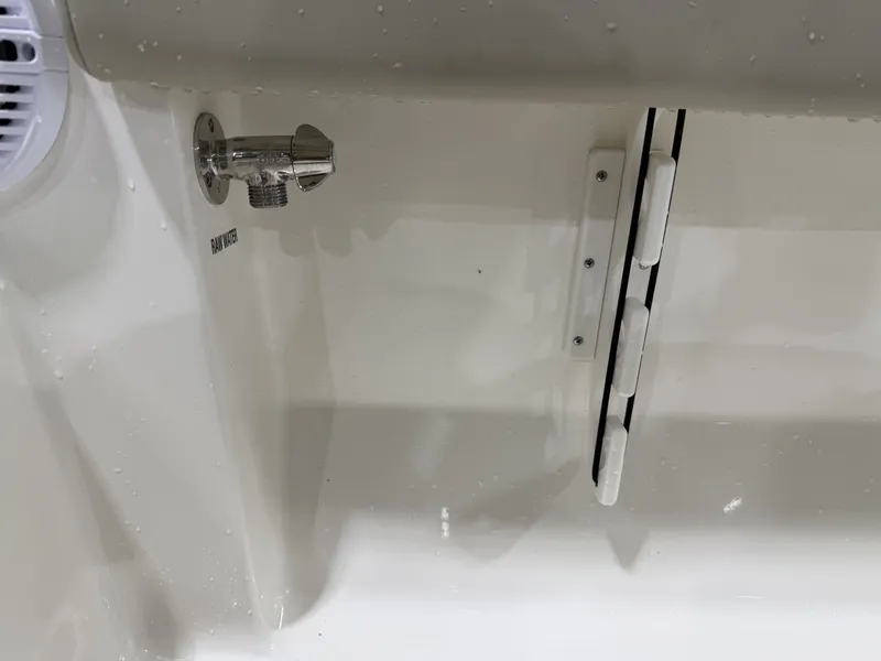 Slide: The Image of Close-up of a water connection on a Key West 189 FS boat. - 21