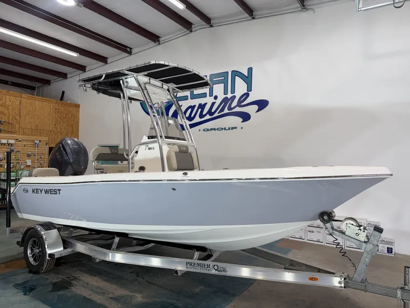Slide: The Image of 2026 Key West 189 FS boat on trailer in warehouse. - 9