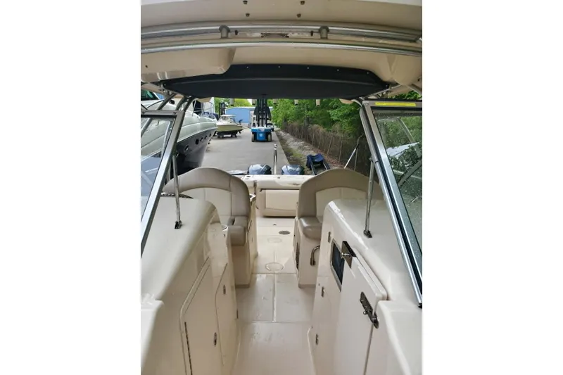 Slide: The Image of 2011 Grady-White Freedom 307 boat interior, featuring spacious seating and sleek design. - 4