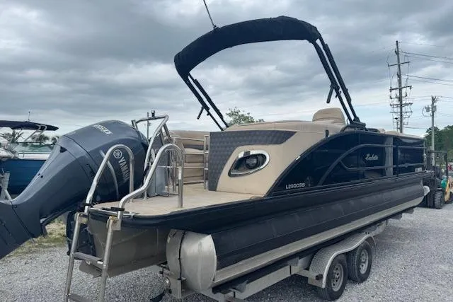 Slide: The Image of 2020 Barletta Lusso 25QCSS pontoon boat on trailer, featuring Yamaha outboard motor. - 5