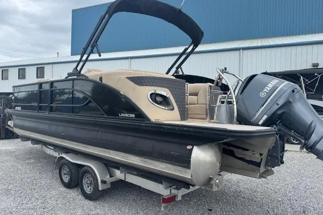 Slide: The Image of 2020 Barletta Lusso 25QCSS pontoon boat with Yamaha engine on trailer. - 7