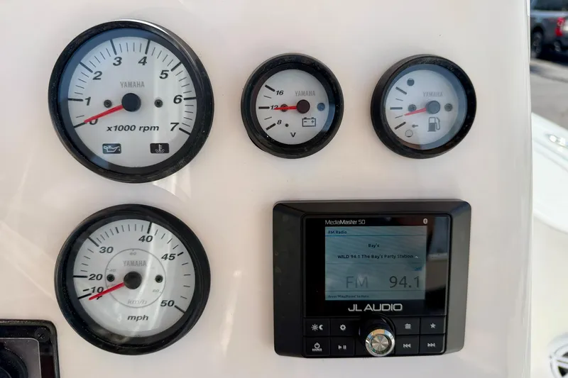 Slide: The Image of Dashboard of 2021 Tidewater 1910 Bay Max with Yamaha gauges and JL Audio system. - 14