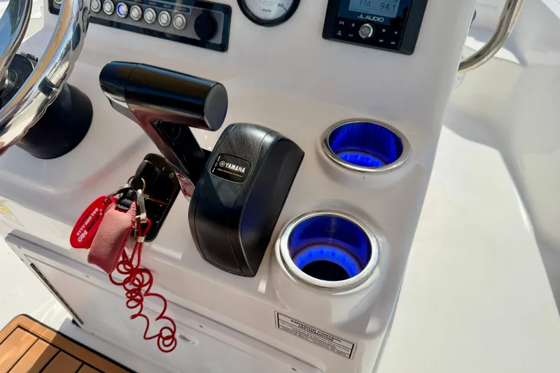 Slide: The Image of 2021 Tidewater 1910 Bay Max boat console with Yamaha controls and illuminated cup holders. - 16