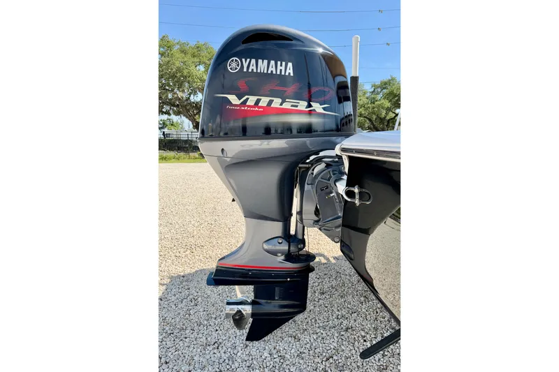 Slide: The Image of Yamaha VMAX outboard motor on 2021 Tidewater 1910 Bay Max boat, parked outdoors. - 28