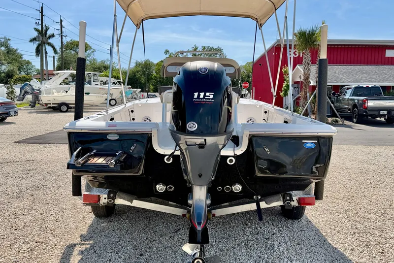 Slide: The Image of 2021 Tidewater 1910 Bay Max boat with Yamaha 115 engine, parked outdoors. - 5