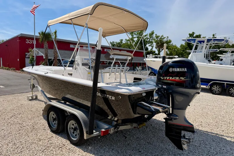 Slide: The Image of 2021 Tidewater 1910 Bay Max boat with Yamaha VMAX engine on a trailer. - 6