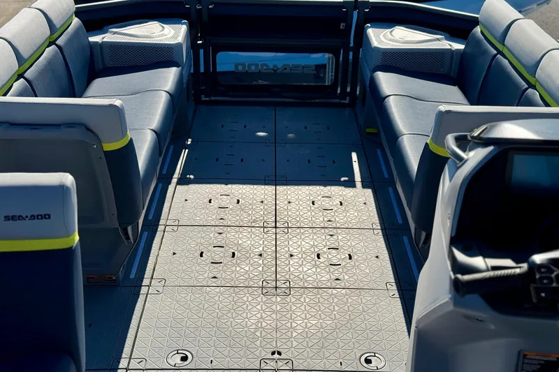 Slide: The Image of Interior view of 2025 Sea-Doo Switch Cruise Limited 21, featuring spacious seating and modern design. - 12