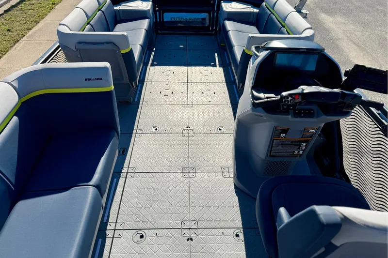 Slide: The Image of 2025 Sea-Doo Switch Cruise Limited 21 interior with spacious seating and modern controls. - 13
