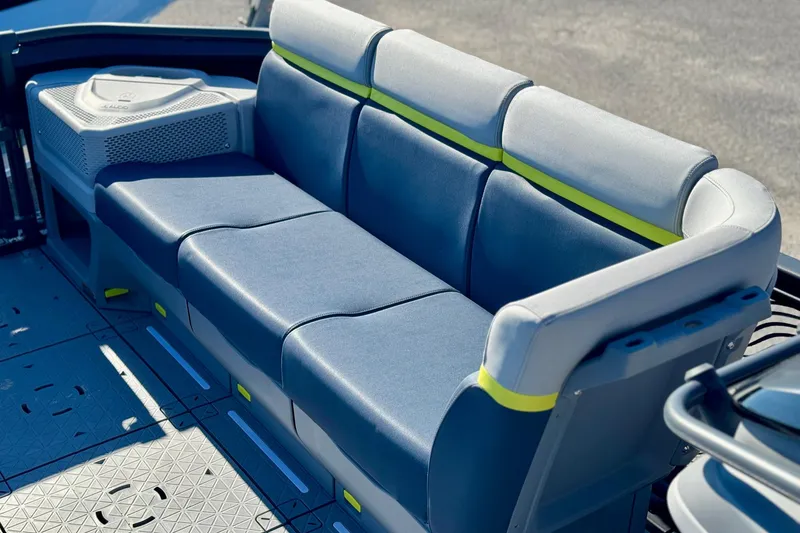 Slide: The Image of 2025 Sea-Doo Switch Cruise Limited 21 boat seating with modern design and comfortable upholstery. - 5