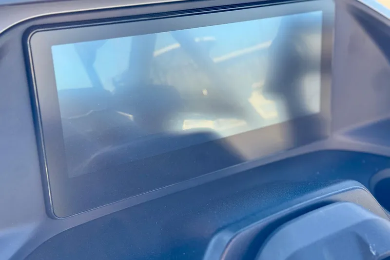 Slide: The Image of Dashboard display of 2025 Sea-Doo Switch Cruise Limited 21, reflecting sunlight. - 7