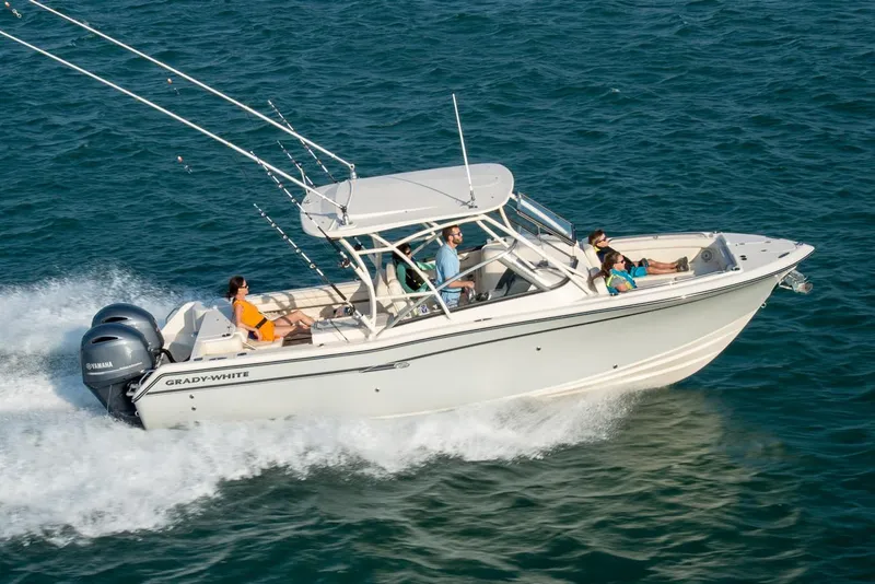 Slide: The Image of Manufacturer Provided Image: 2016 Grady-White Freedom 275 boat cruising on open water. - 12