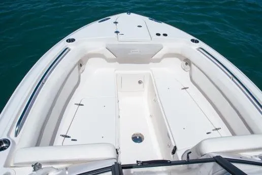 Slide: The Image of Manufacturer Provided Image: 2016 Grady-White Freedom 275 boat bow seating area on clear water. - 16
