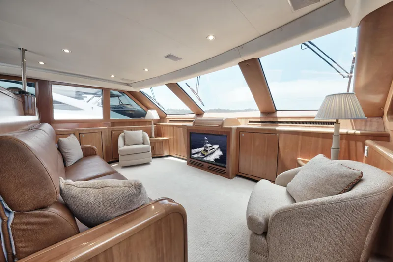 Slide: The Image of Luxurious 2001 Donzi yacht interior with plush seating and elegant wood finishes. - 15