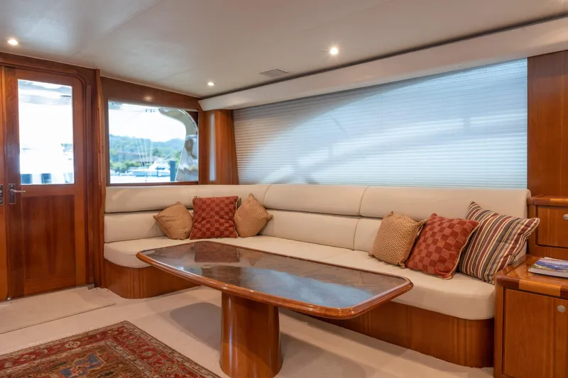 Slide: The Image of Luxurious 2001 Donzi yacht interior with elegant seating and wooden accents. - 24
