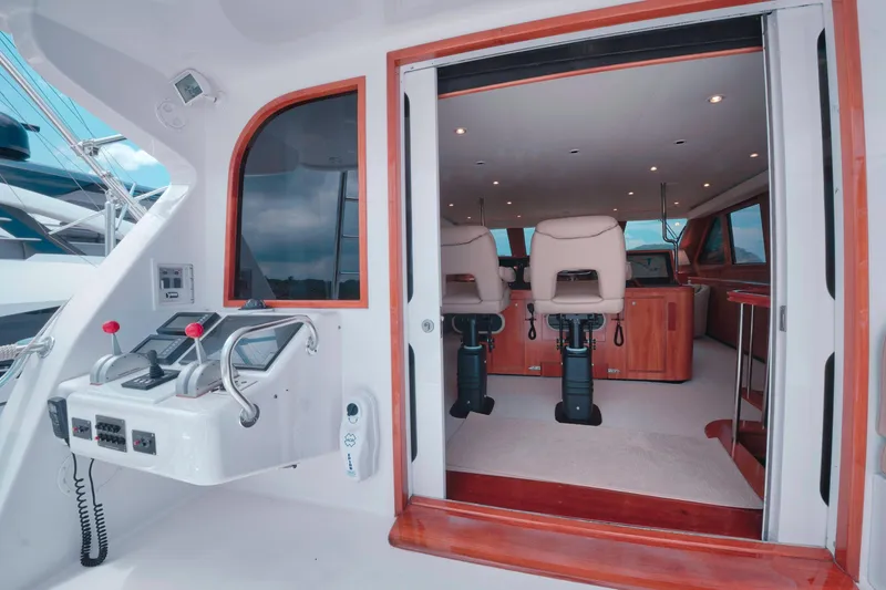 Slide: The Image of Interior view of a 2001 Donzi boat with modern helm and seating area. - 35