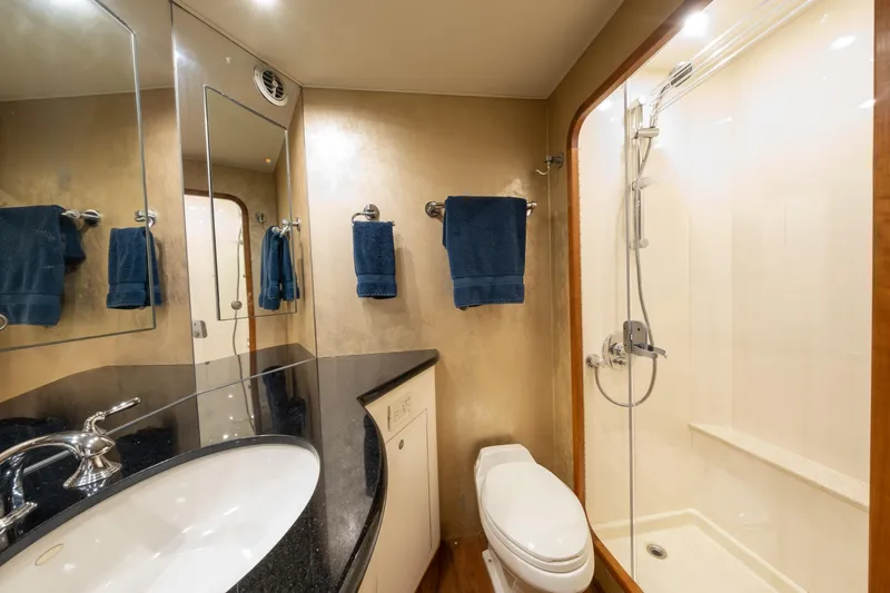 Slide: The Image of Luxurious 2001 Donzi yacht bathroom with modern fixtures and elegant design. - 50