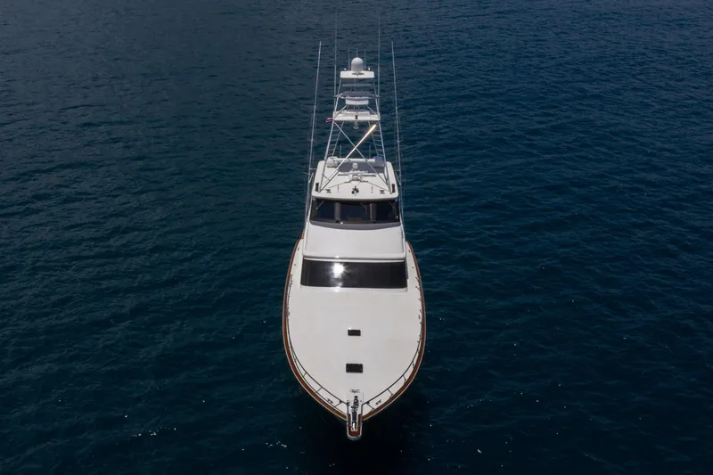 Slide: The Image of Aerial view of a 2001 Donzi yacht on calm blue waters. - 7