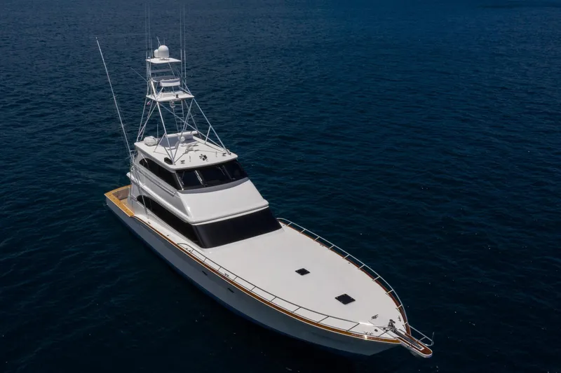 Slide: The Image of Aerial view of a 2001 Donzi yacht on calm blue waters. - 8