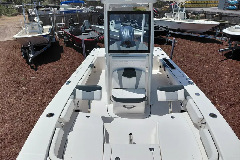 Slide: The Image of 2023 Robalo 246 Cayman boat interior, featuring spacious seating and modern design. - 12