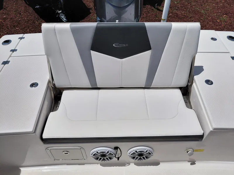 Slide: The Image of 2023 Robalo 246 Cayman boat seat with integrated speakers and sleek design. - 43