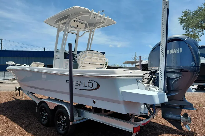 Slide: The Image of 2023 Robalo 246 Cayman boat with Yamaha engine on trailer, outdoor display. - 5