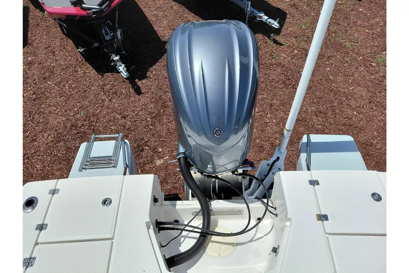Slide: The Image of 2023 Robalo 246 Cayman boat with Yamaha outboard motor, viewed from above. - 50