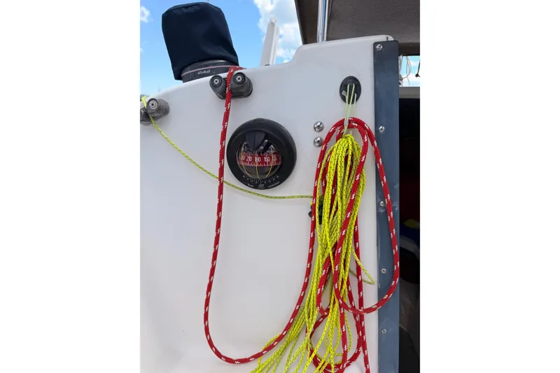 Slide: The Image of Close-up of Corsair F-24 MkII sailboat ropes and compass, 2000 model. - 8