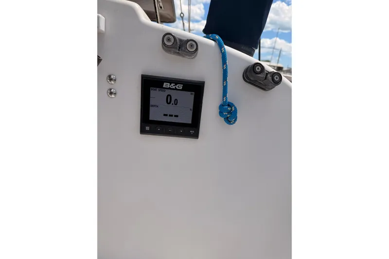 Slide: The Image of B&G display on 2000 Corsair F-24 MkII sailboat, showing speed and depth. - 9