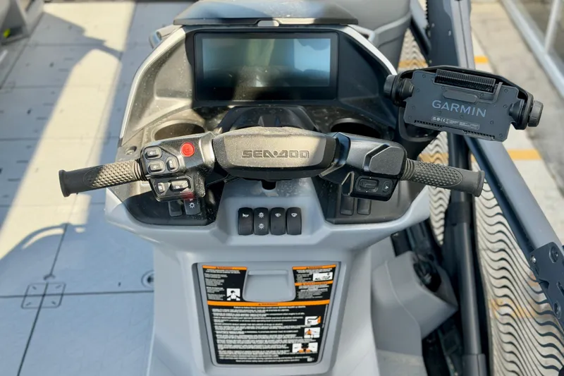 Slide: The Image of 2026 Sea-Doo Switch Cruise Limited 21 dashboard with Garmin mount and controls. - 12