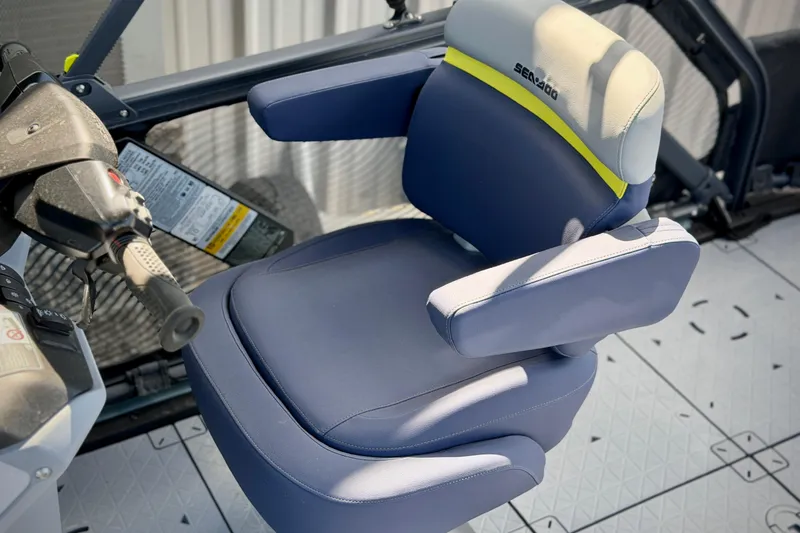 Slide: The Image of 2026 Sea-Doo Switch Cruise Limited 21 captain's chair with ergonomic design and controls. - 13