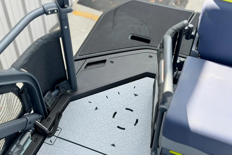 Slide: The Image of 2026 Sea-Doo Switch Cruise Limited 21 deck area with seating and textured flooring. - 15