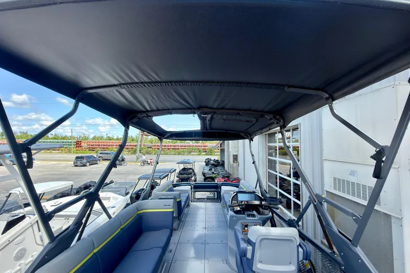 Slide: The Image of 2026 Sea-Doo Switch Cruise Limited 21 interior with canopy, showcasing seating and controls. - 20