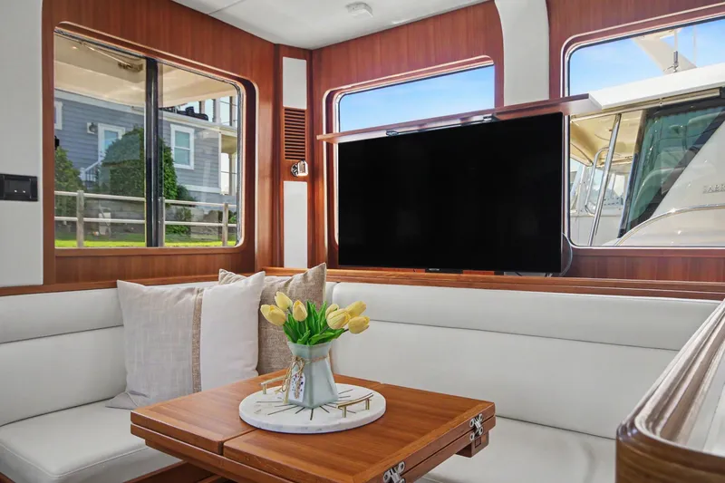 Slide: The Image of Luxurious interior of 2022 North Pacific 45 Pilothouse with elegant seating and modern decor. - 12