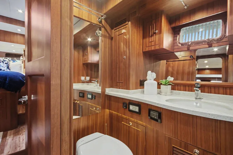 Slide: The Image of Luxurious wooden bathroom interior in 2022 North Pacific 45 Pilothouse yacht. - 23