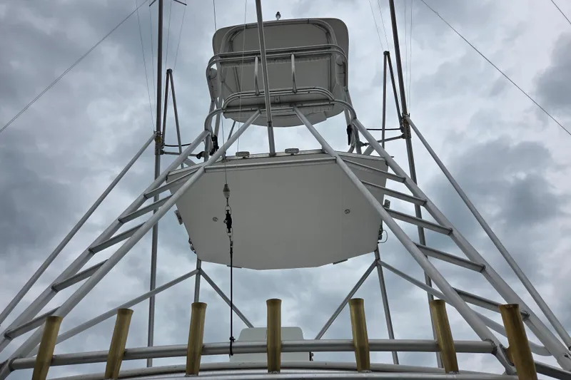 Slide: The Image of View of Cabo 35 Express 1999 boat tower against cloudy sky. - 11