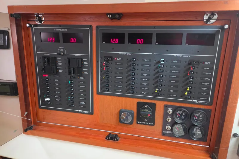 Slide: The Image of Electrical control panel on a 1999 Cabo 35 Express boat. - 26