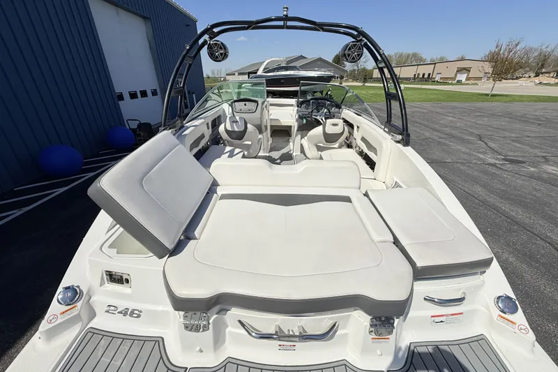 Slide: The Image of 2016 Chaparral 246 SSi boat interior with spacious seating and sleek design. - 10