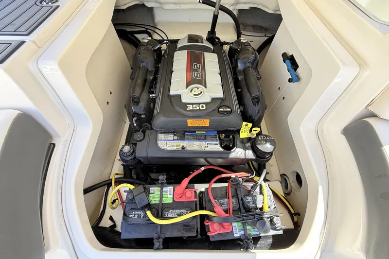Slide: The Image of Engine compartment of a 2016 Chaparral 246 SSi boat, featuring a 6.2L 350 engine. - 22