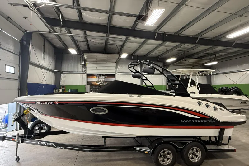Slide: The Image of 2016 Chaparral 246 SSi boat on trailer in indoor storage facility. - 28
