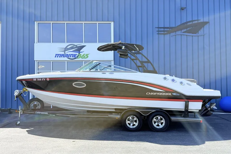 Slide: The Image of 2016 Chaparral 246 SSi boat on trailer, parked outside Marine365 building. - 4