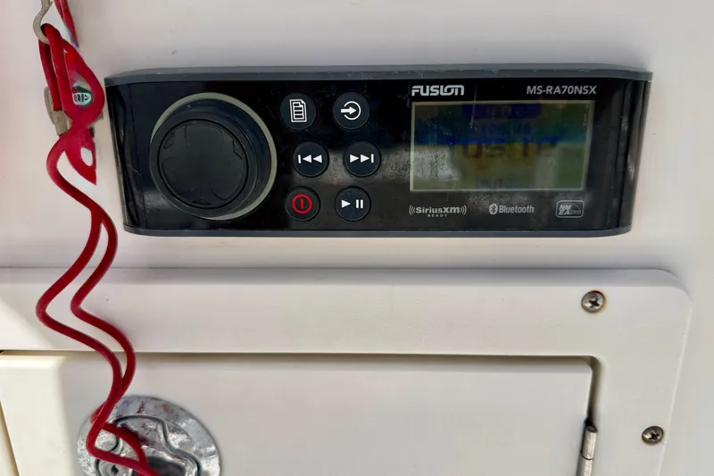 Slide: The Image of Fusion MS-RA70NSX stereo system on 2010 NauticStar 2110 Nautic Bay boat dashboard. - 15