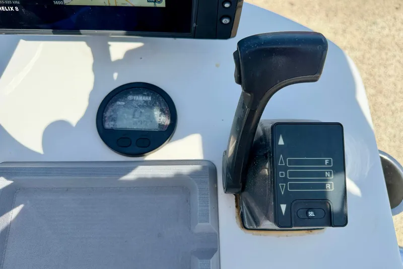 Slide: The Image of Close-up of 2010 NauticStar 2110 Nautic Bay boat controls and Yamaha display. - 20