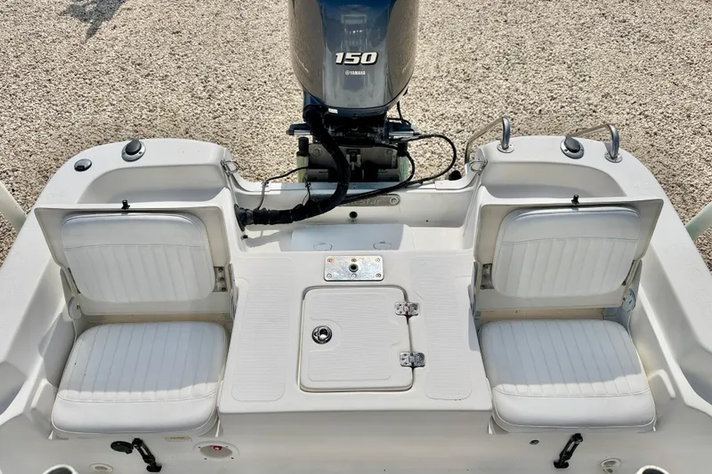 Slide: The Image of 2010 NauticStar 2110 Nautic Bay boat with Yamaha 150 engine and dual seating. - 26